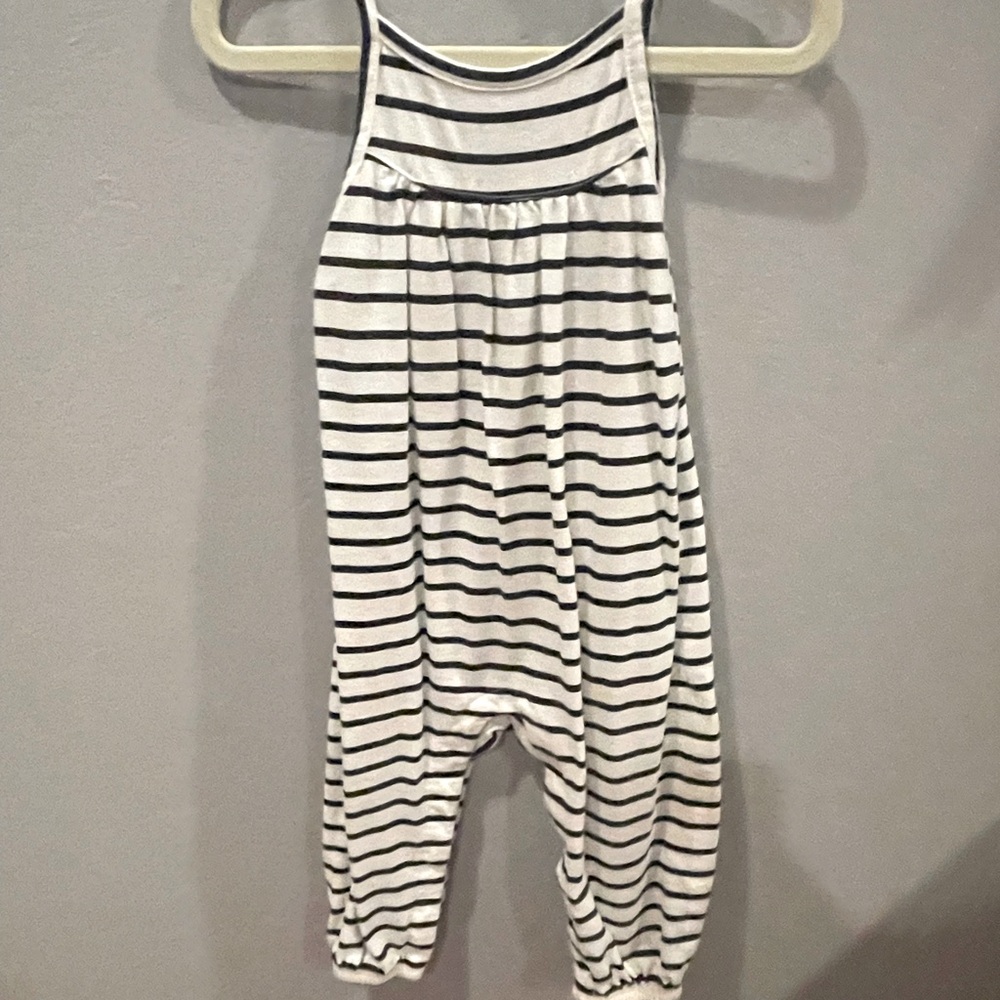 Black and white striped jumpsuit.